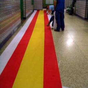 Preparación de bandera de España en rollos DIFAS 07 Sevilla