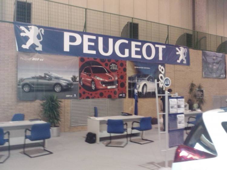 Cartel lona publicitaria de Gran formato. Feria del stok Sevilla Stand Peugeot.