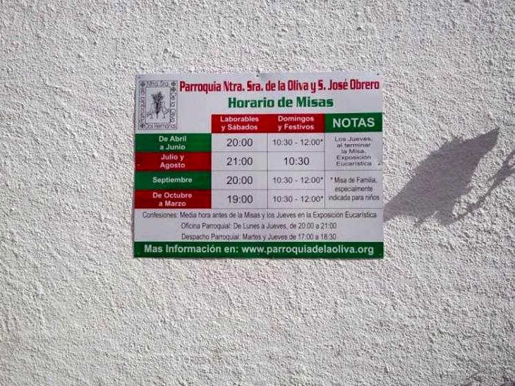 Rótulo cartel Señalizador de Horarios, Parroquia de la Oliva Dos Hermanas Sevilla