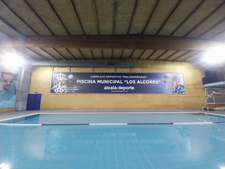 Cartel de lona publicitaria de Gran formato, enmarcado en bastidor y cosida para Malasma&ntilde;anas en Alacl&aacute; de Guadaira Sevilla.