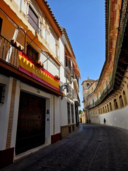 Lona con la bandera de Espa&ntilde;a para balc&oacute;n. Cliente particular en &Eacute;cija Sevilla.