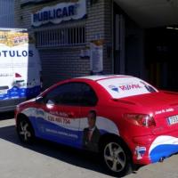 Rotulación integral de vehículo en impresión digital sobre vinilo laminado fundido. Inmobiliarias Remax Dos Hermanas, Sevilla