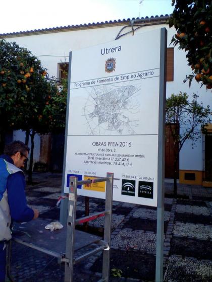 Valla publicitaria o cartelera, así como cartel de obra  panelable y rotulada con vinilo. Programa 2016 de Fomento Agrario del Ayuntamiento de Utrera Sevilla