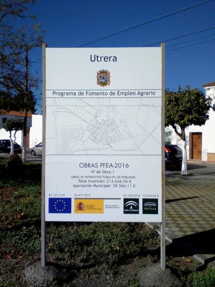 Valla publicitaria o cartelera, así como cartel de obra  panelable y rotulada con vinilo. Programa 2016 de Fomento Agrario del Ayuntamiento de Utrera Sevilla
