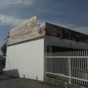Rotulación de frontal en vinilos laminados. Fábrica de Segundín en Aracena Huelva.