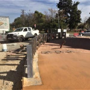 Rótulo de letras corpóreas en acero cortén. Puerto de Sevilla. Trabajo realizado para Tragsa.